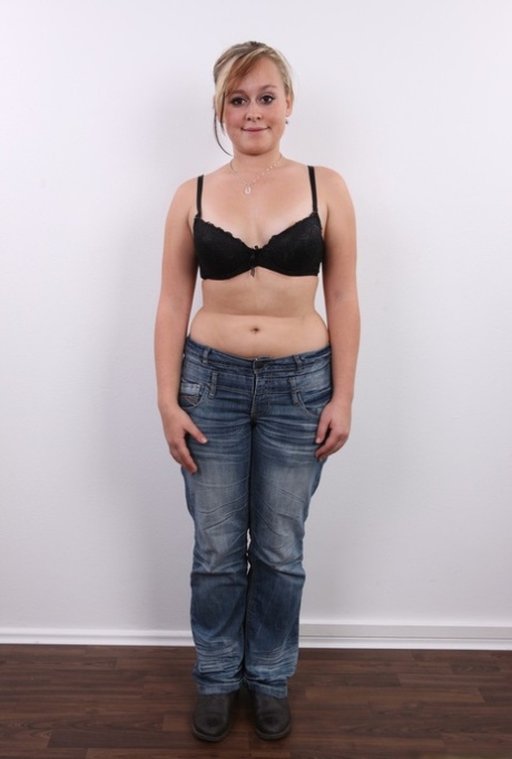 Chubby amateur female stands naked after removing her clothing