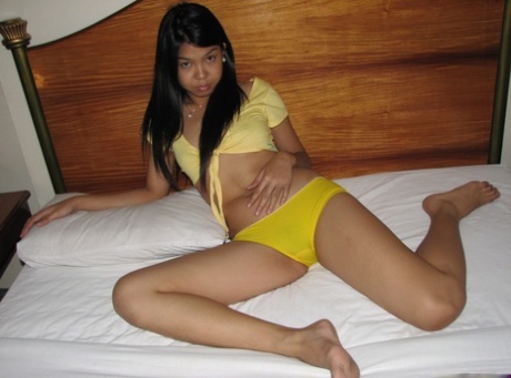 Young looking Asian girl gives up her trimmed muff to a foreigner