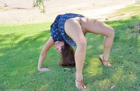 Sexy teen gives nude upskirt outdoors & spread naked to show small tits