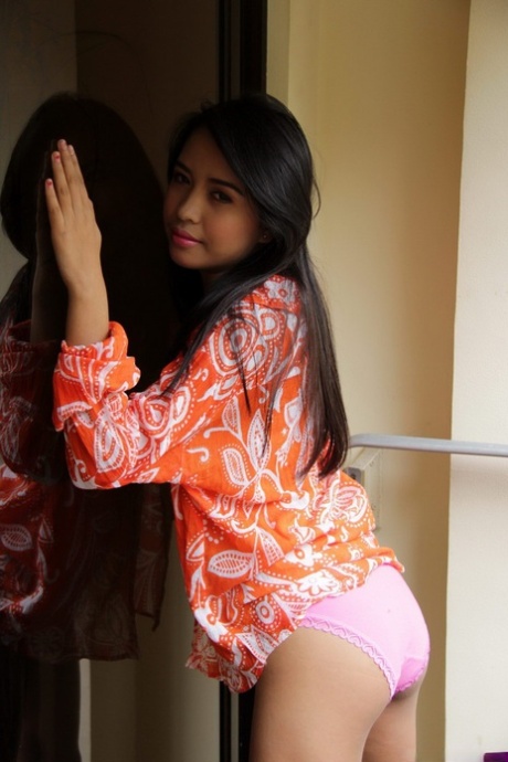 Sexy Asian amateur with tiny titties showing tight pussy with legs spread