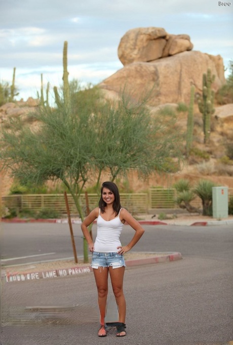 Nice teen strips to her sandals while in the public domain