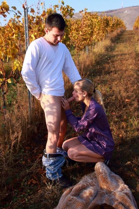 Young amateur and her boyfriend have sex on the ground during a Fall day