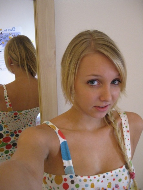 Blonde first timer exposes her tits and twat for self shots in the mirror