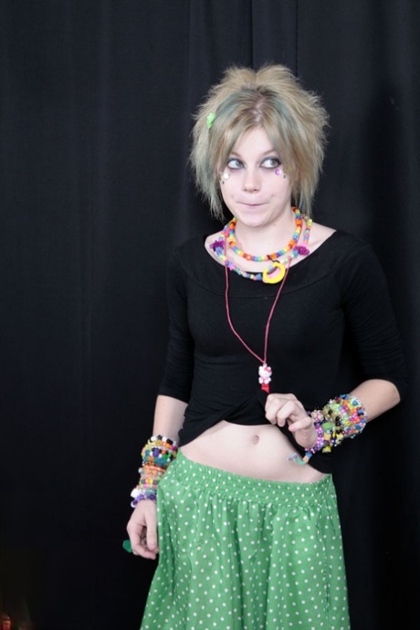 Teen raver Seattle sets her small tits free in solo action