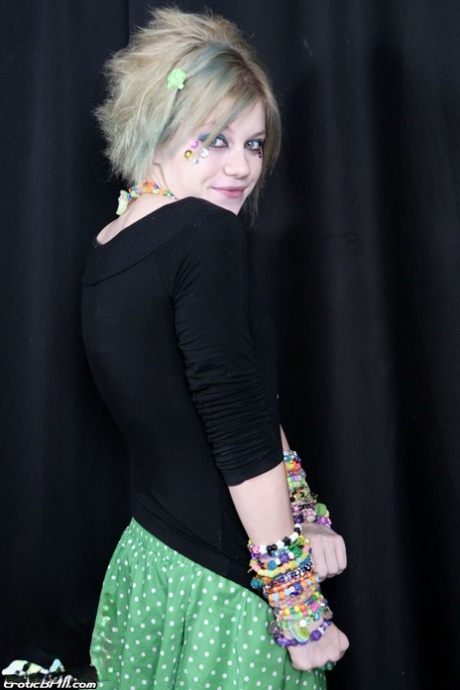 Teen raver Seattle sets her small tits free in solo action