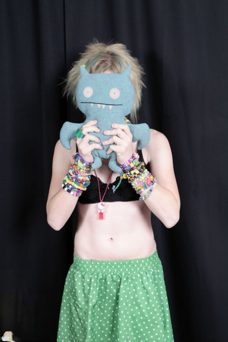 Teen raver Seattle sets her small tits free in solo action