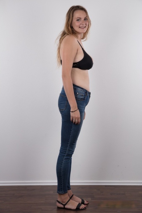 Chubby teen stands fully clothed before doing the same without any clothes on