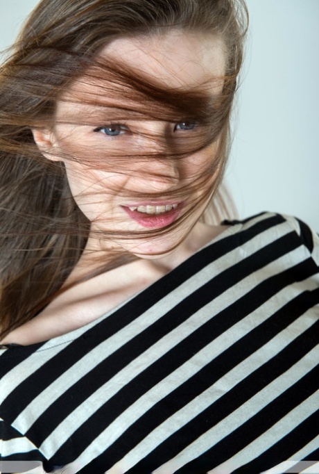 Caucasian teen Anne T strikes great nude poses during solo action