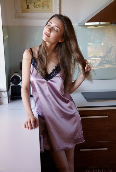 Slender teen Mila Azul uncovers nice tits before revealing her yummy pussy
