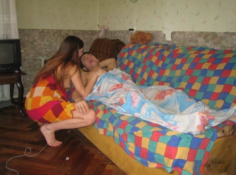 Horny young girl wakes up her boyfriend for an urgent fuck