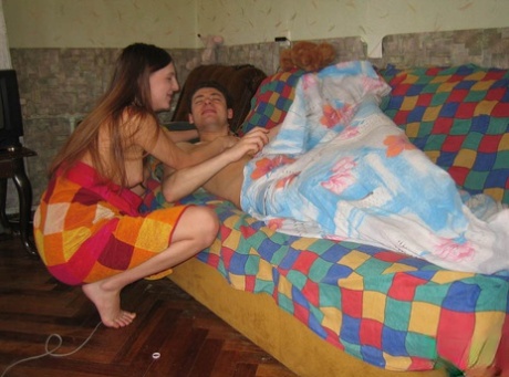 Horny young girl wakes up her boyfriend for an urgent fuck