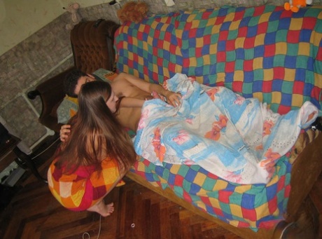 Horny young girl wakes up her boyfriend for an urgent fuck