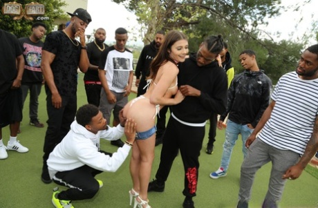 Brunette slut spits out jizz after interracial blowbang by golf clubhouse