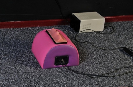 Amateur BBW has her hands tied above her head while riding a Sybian