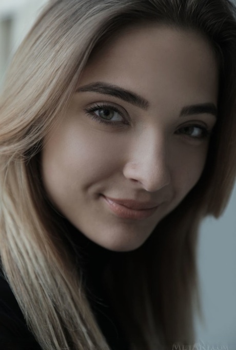 Teen model Santa removes fishnet pantyhose as she gets totally naked