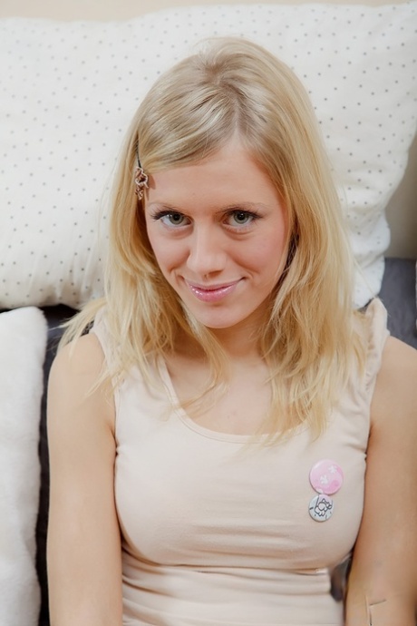 Natural blonde takes a massive cock in her mouth and shaved pussy too