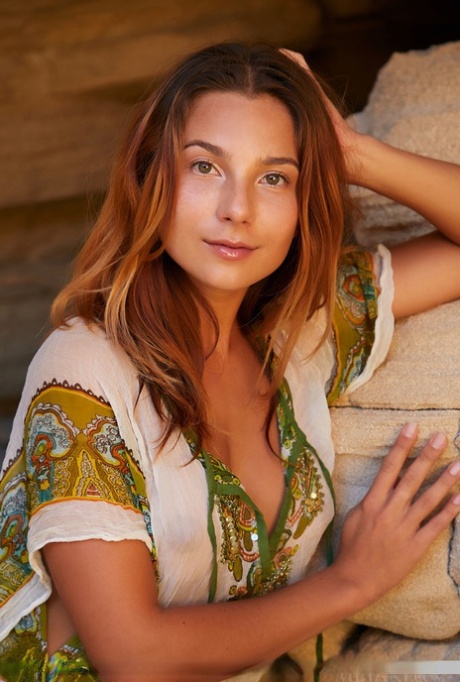 Nice teen Belka releases her great body from clothing inside a sea cave