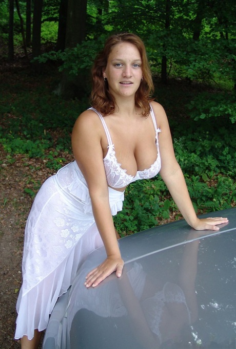 Young solo girl Jana Kucova releases her huge boobs near a forest