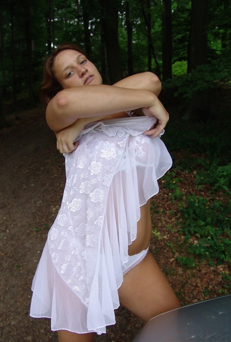 Young solo girl Jana Kucova releases her huge boobs near a forest