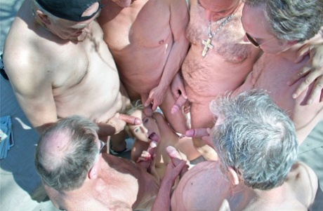 Sexy ten girl volunteers for a gangbang and blowbang with old men