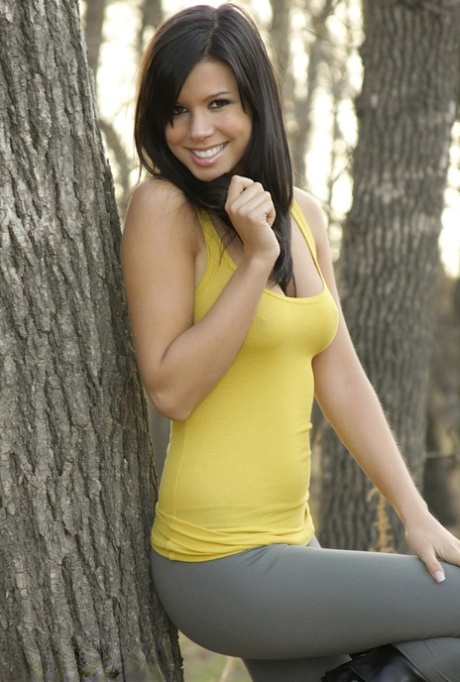 Amateur model Destiny Moody tales off her spandex pants in the woods