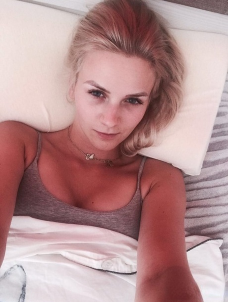 Blonde girl from Czechoslovakia Zdenka takes non nude self shots