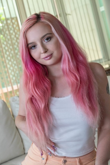 Cute girl with pink hair and pierced nipples pleasures a cock in POV mode