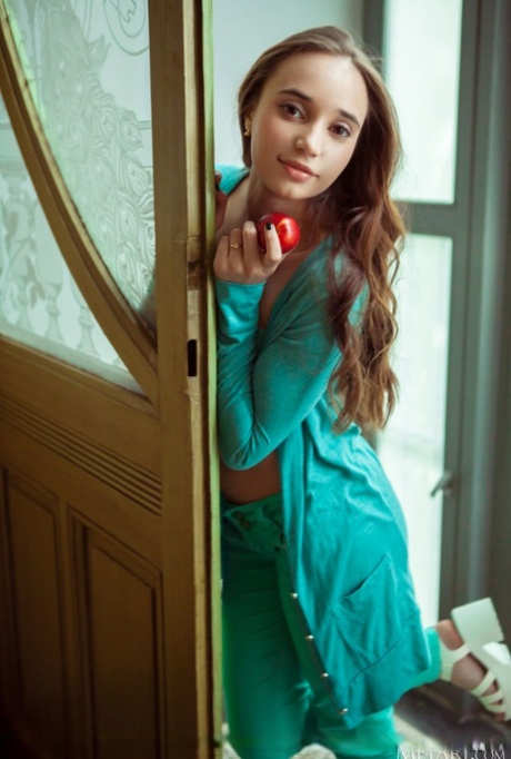 Nice teen Messiah removes her coordinated outfit to get totally naked