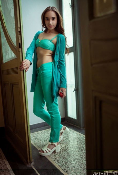 Nice teen Messiah removes her coordinated outfit to get totally naked