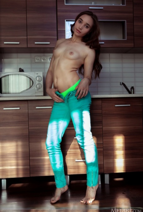 Nice teen Messiah removes her coordinated outfit to get totally naked