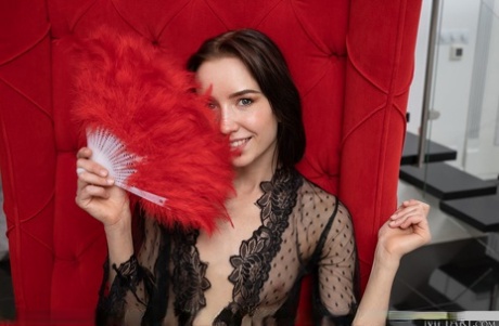 Pretty teen Erna puts the focus on her edible pussy once she is bare naked