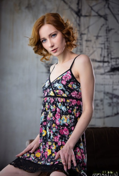 Young rated Rona Talin strikes confident nude poses after disrobing