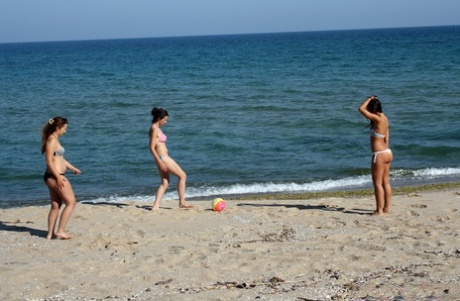 2 young looking girls masturbate after going topless at the beach