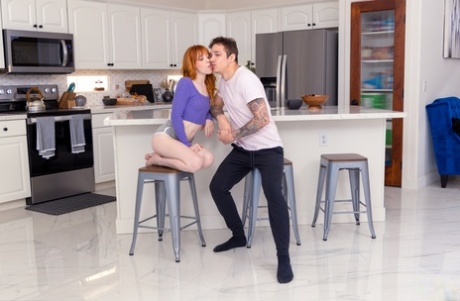 Young redhead Madi Collins has sex on a bed with her stepbrother