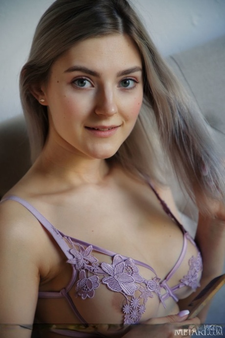 Young beauty Eva Elfie works her juicy ass while removing sensual lingerie