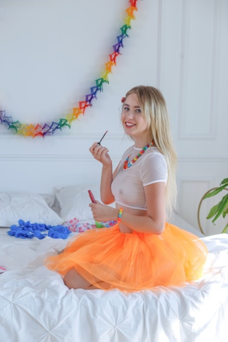 Sweet blonde teen Dema gets totally naked in a playful manner