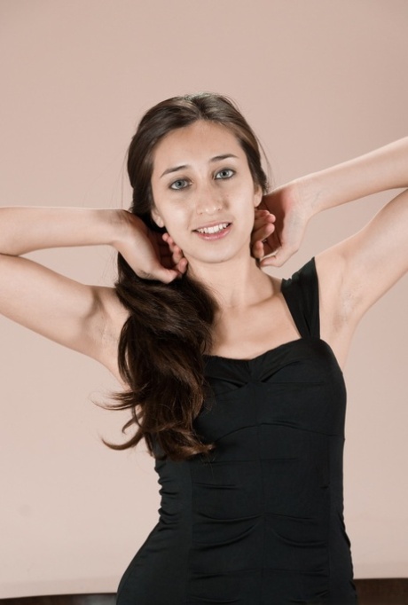 Teen solo girl showcases her natural pussy in her nude posing debut