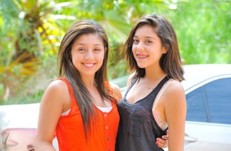 Cute teen girls in jeans undress to bare shaved pussy and tiny titties