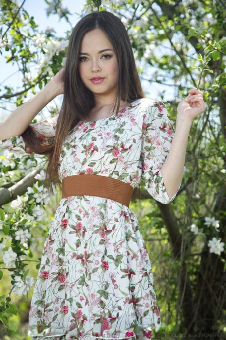 Euro babe Li Moon spreading shaved teen pussy for outdoor glam pictures
