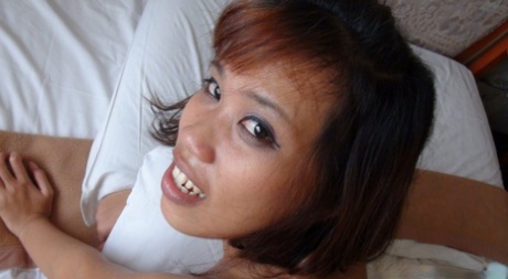 Asian teen Chea blows and fuck an uncut cock during closeup action
