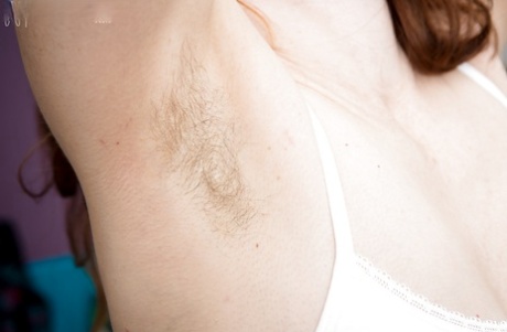 Horny amateur teen Kirsa showing off her feet and hairy armpits