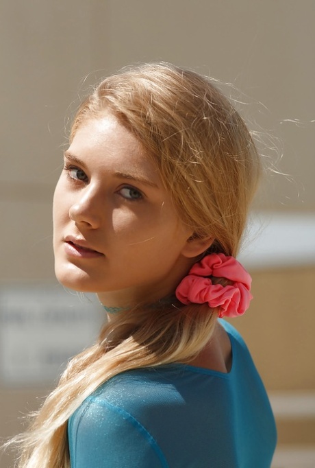 Adorable blonde teen Nola Berry showing off her gorgeous boobs