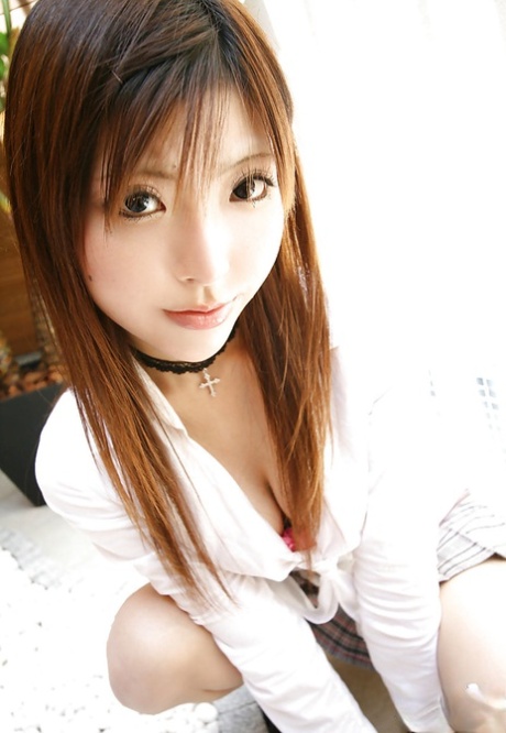 Cute asian teen gives a blowjob and receives a cumshot into her mouth