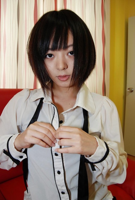 Saucy asian teen Haruka Okubo gets naked and has some pussy fingering fun