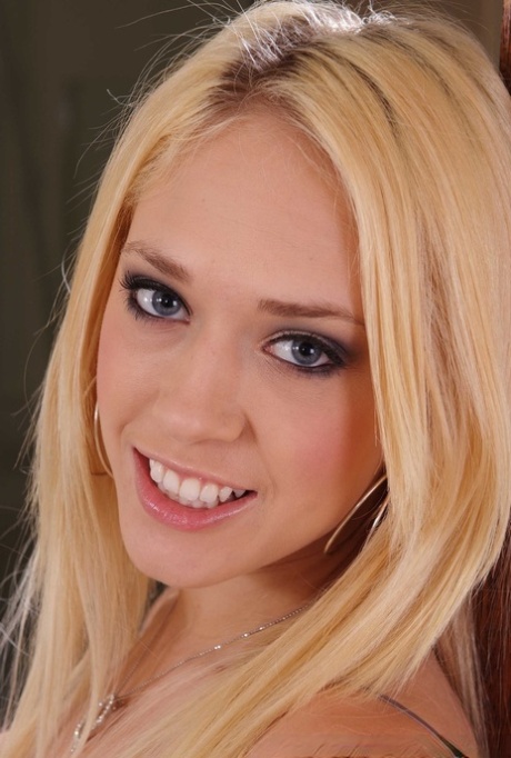 Blonde MILF Kagney Linn Karter shows her perfect fakes and poses nude