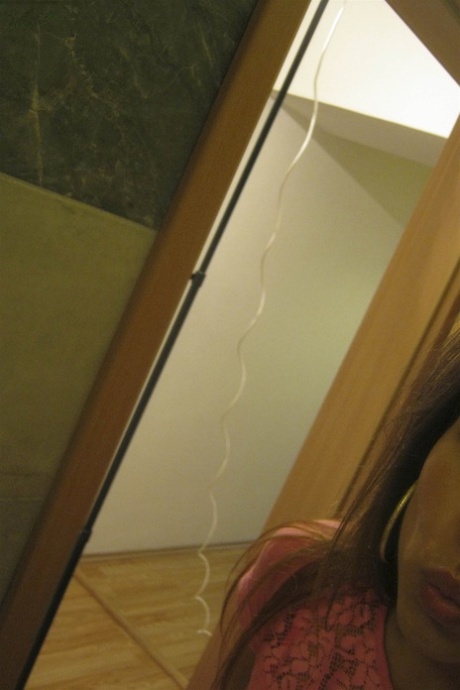 Amateur teen Jenny 9 twitches her nipples and films herself in the mirror
