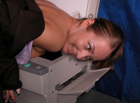 Amateur teen with tiny breasts Emillia rubs her twat at her workplace