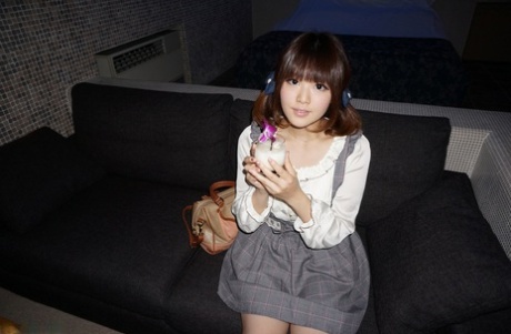 Japanese virgin Tomoka Sakurai undresses and poses in her sexy lingerie
