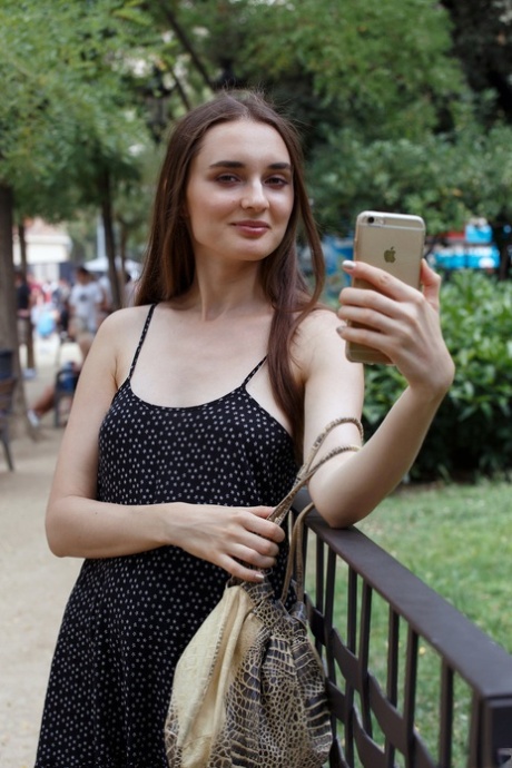 Amateur model Vitalia Pugova exposes her tits and ass while out in public