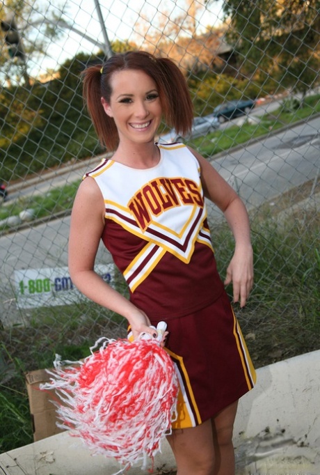 Redhead cheerleader Tweety Valentine gets banged and facialed by black bulls